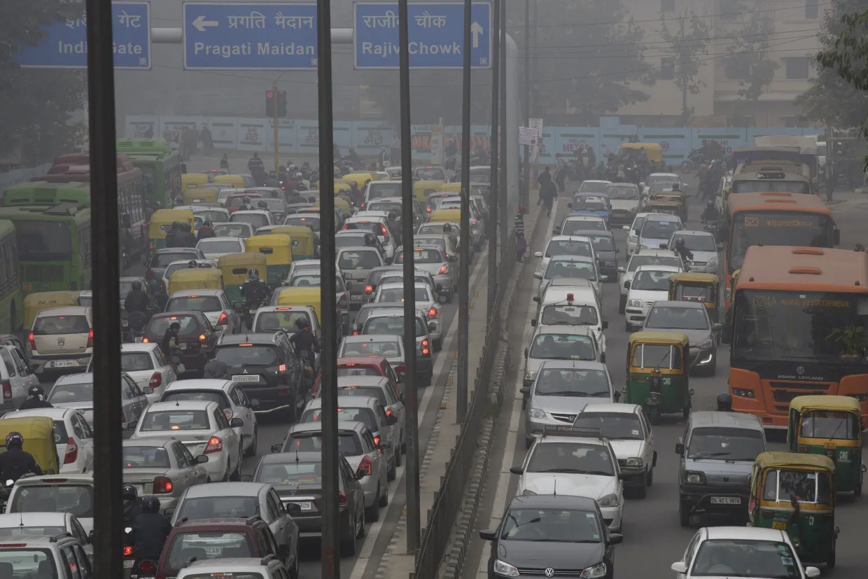 Vehicles in traffic on a road&nbsp;in New Delhi.
