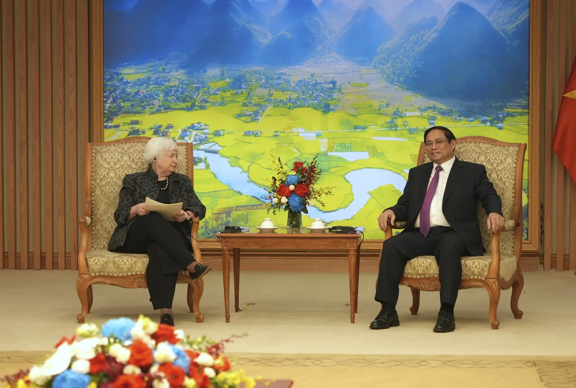Janet Yellen, left, with Pham Minh Chinh in Hanoi on July 20.