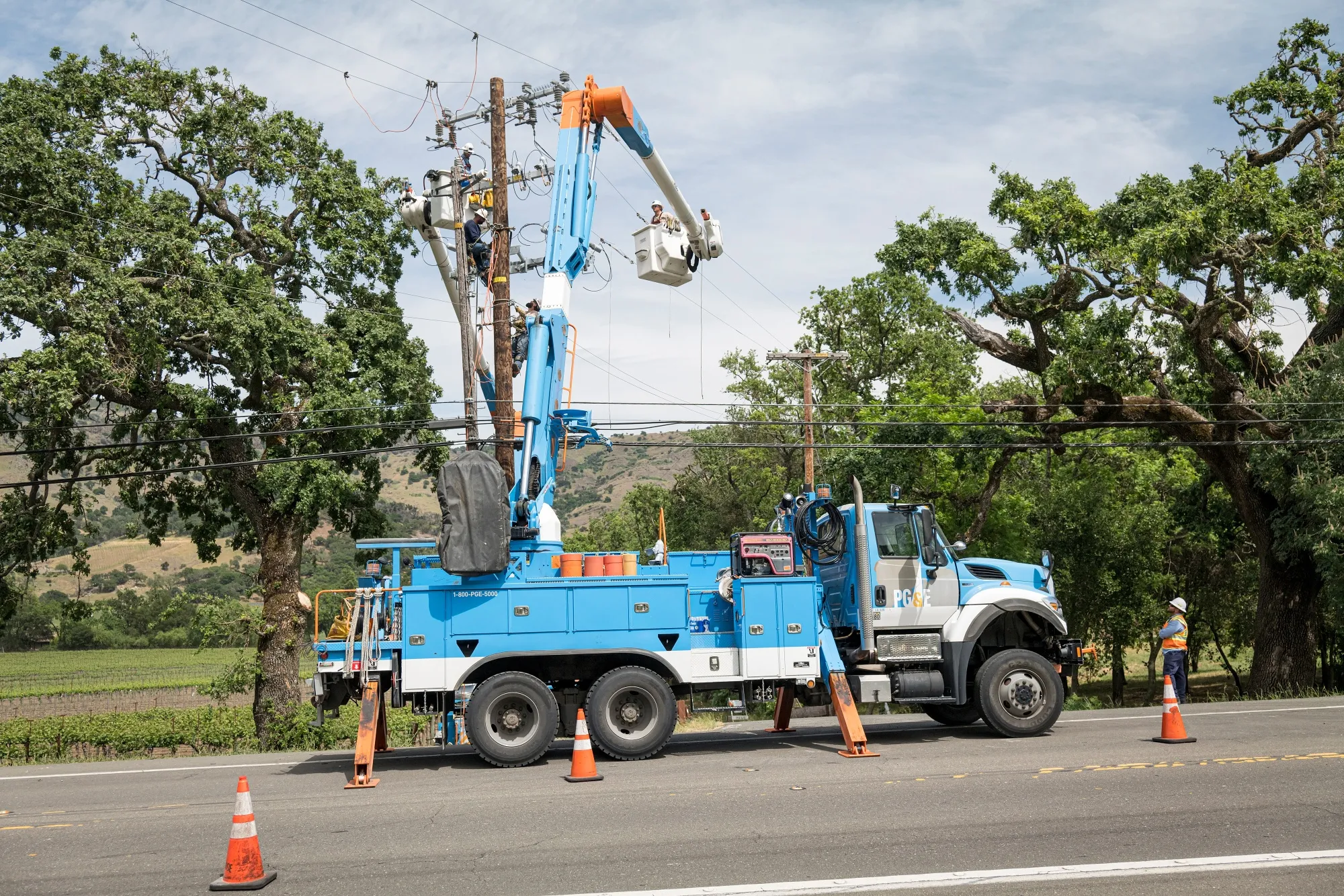 PG&E workers perform an installalltion in Yountville, California.