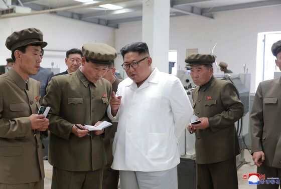 Kim's Testy Factory Trips Show Push to Fix North Korea Economy