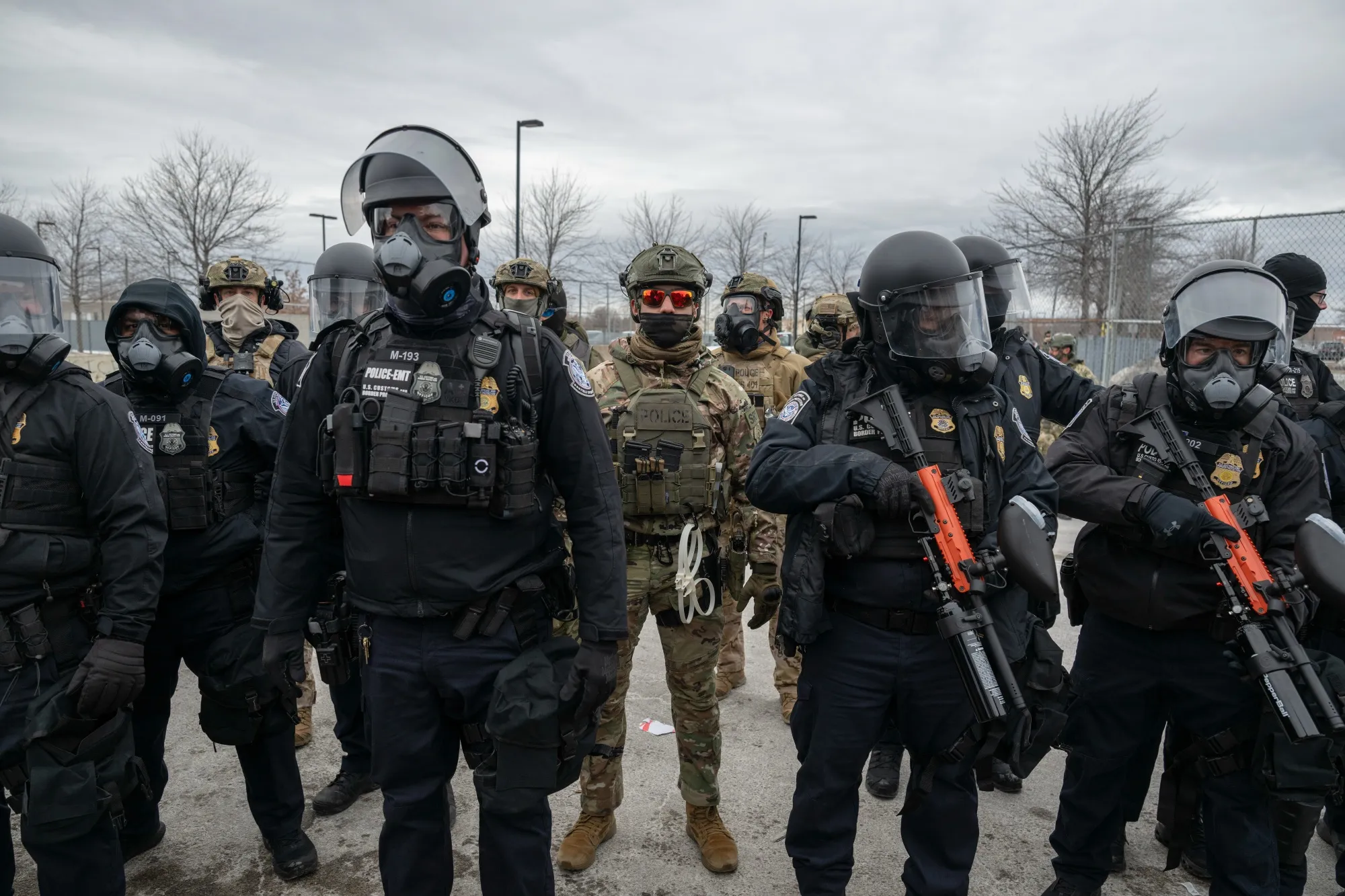 Federal law enforcement officers attempt to disperse demonstrators protesting&nbsp;outside the Bishop Henry Whipple Federal Building in St. Paul, Minnesota on Jan. 15.&nbsp;