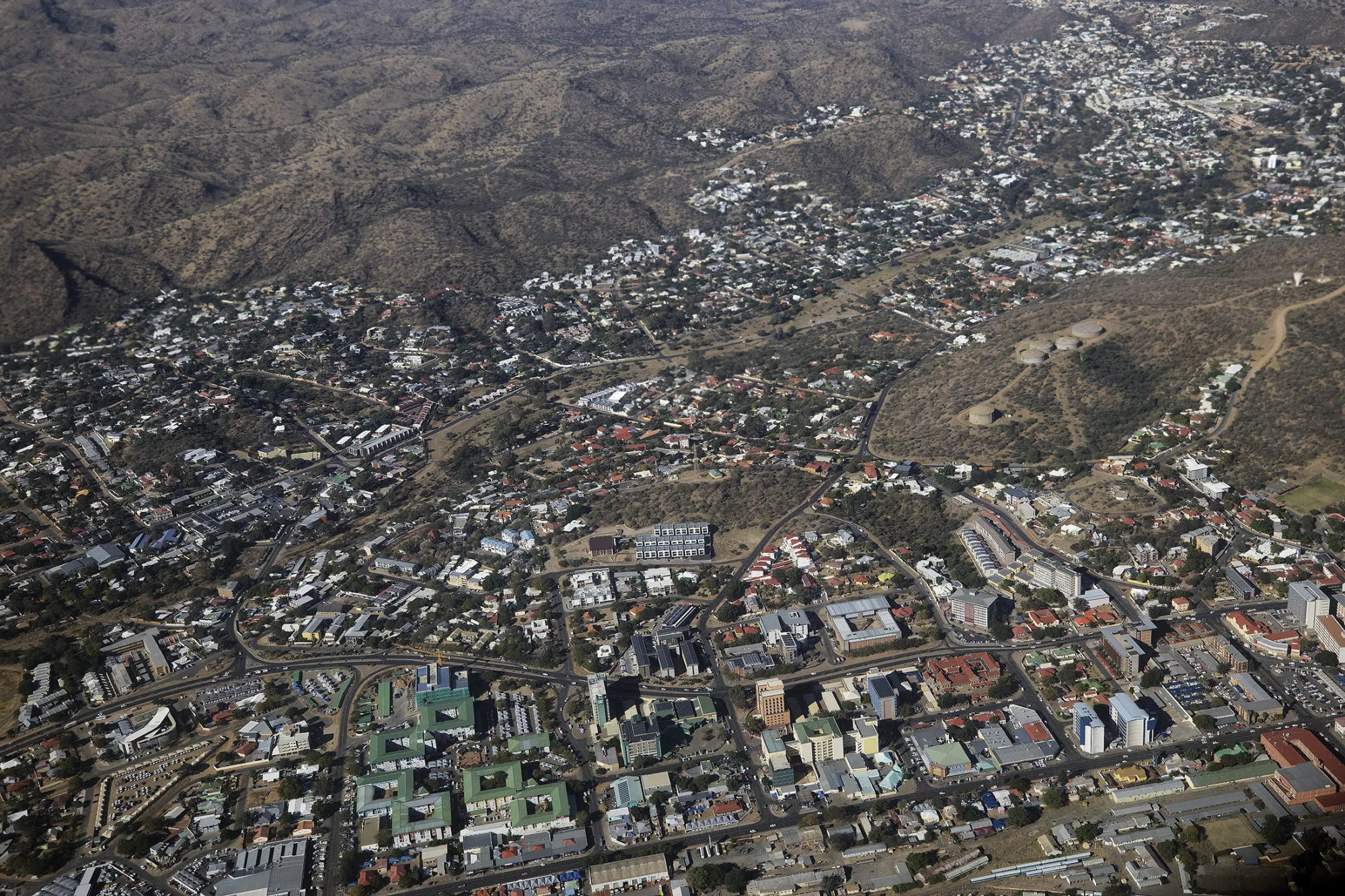 Properties stand on the city skyline seen in this aerial view of the capital city of Windhoek, Namibia, on Wednesday, June 14, 2017.
