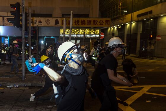 Attacks and Beijing's Warnings Fuel Hong Kong Anxiety