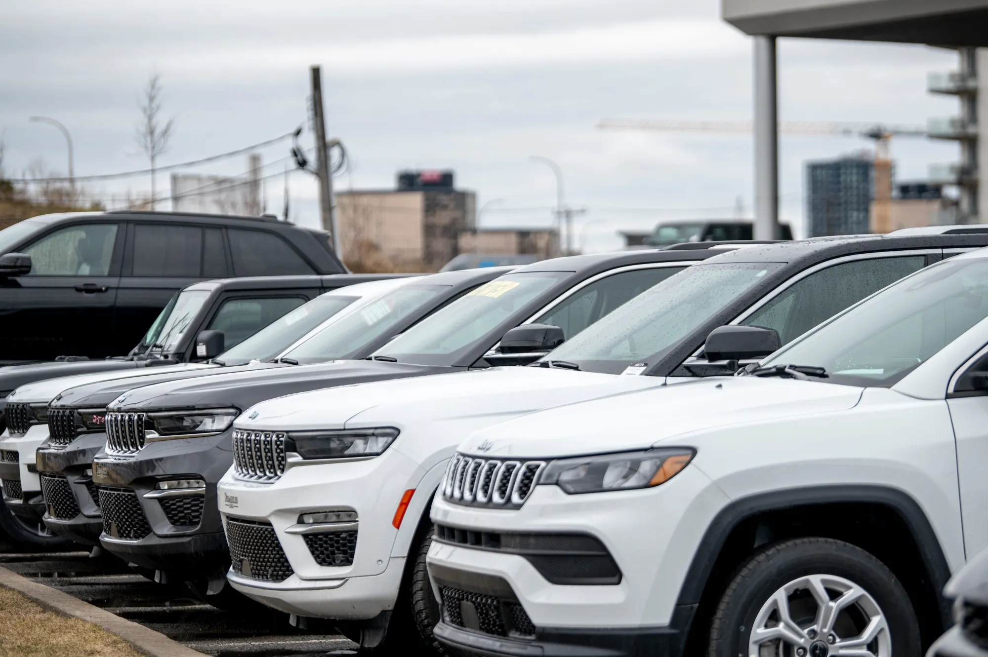 Jeep Compass SUVs at a dealership in Laval, Quebec.