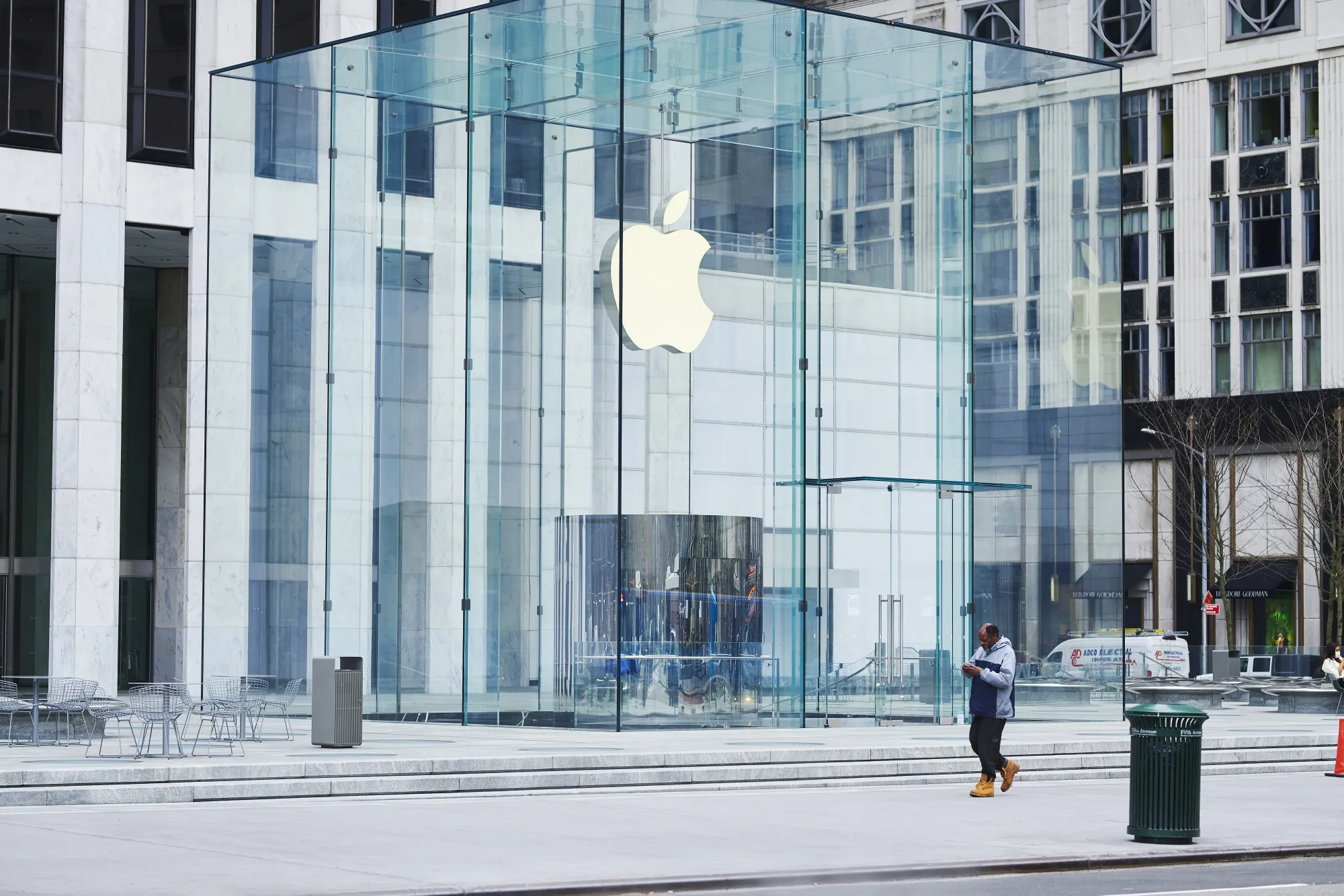 A pedestrian passes in front of the Apple Inc. store on 5th Avenue in the Upper East Side neighborhood of New York on&nbsp;March 20.