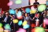 Confetti rain on Taiwan's president and other politicans holding Taiwanese flags