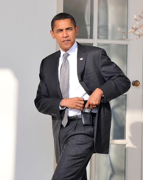 Obama with his Blackberry in 2009.