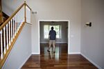 A prospective home buyer tours a house for sale in Dunlap, Illinois, U.S.