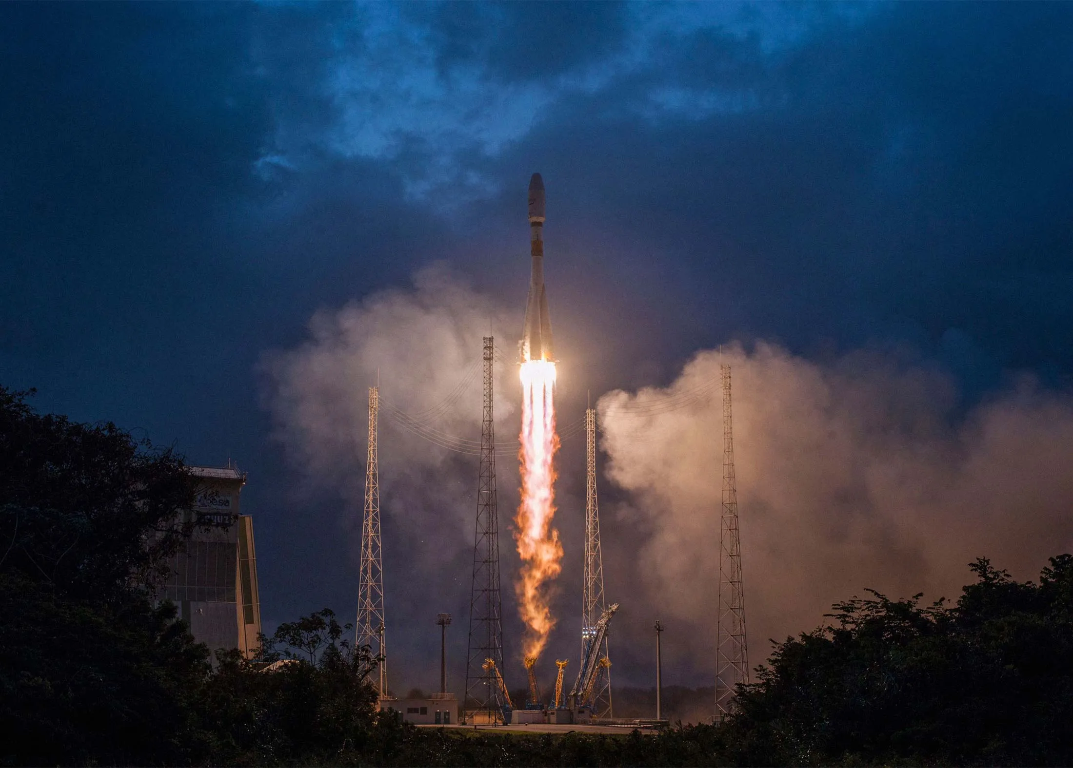 A rocket carrying the first six OneWeb satellites lifts off from the Guiana Space Centre, near Kourou, on Feb. 27.