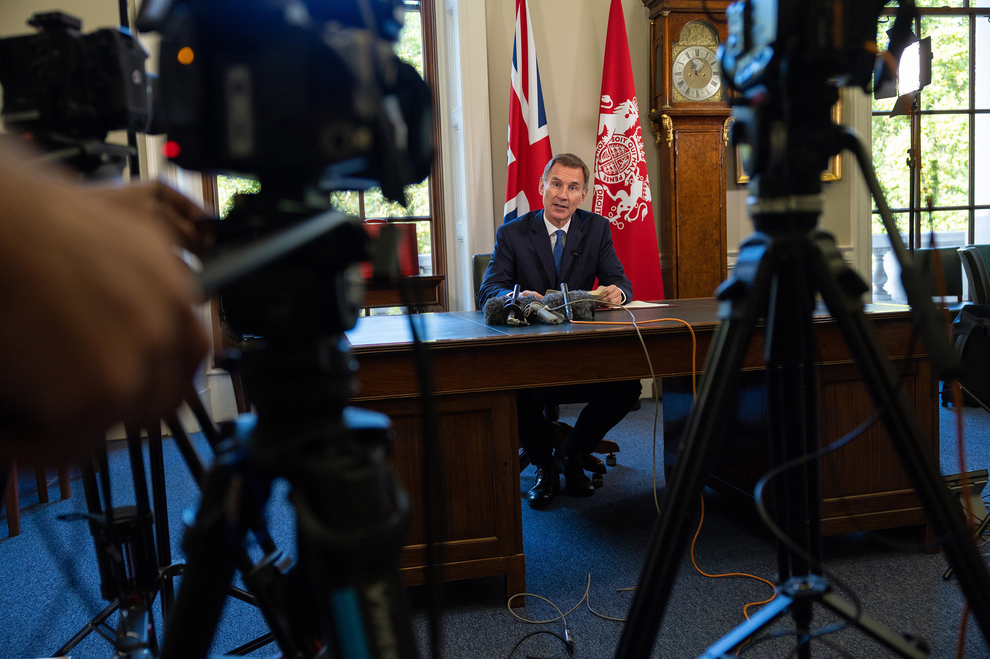 Jeremy Hunt makes his televised statement from HM Treasury in London.
