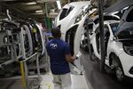 Automobile Assembly Inside a Peugeot SA Factory