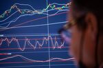 A trader works on the floor of the New York Stock Exchange (NYSE) in New York, U.S., on Monday, Aug. 23, 2021.