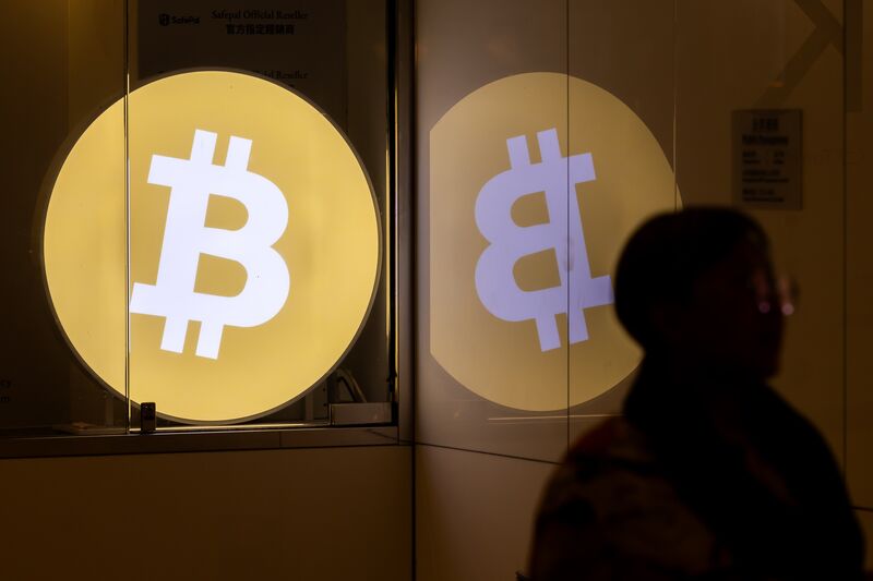 Bitcoin signage at a cryptocurrency exchange in Hong Kong.