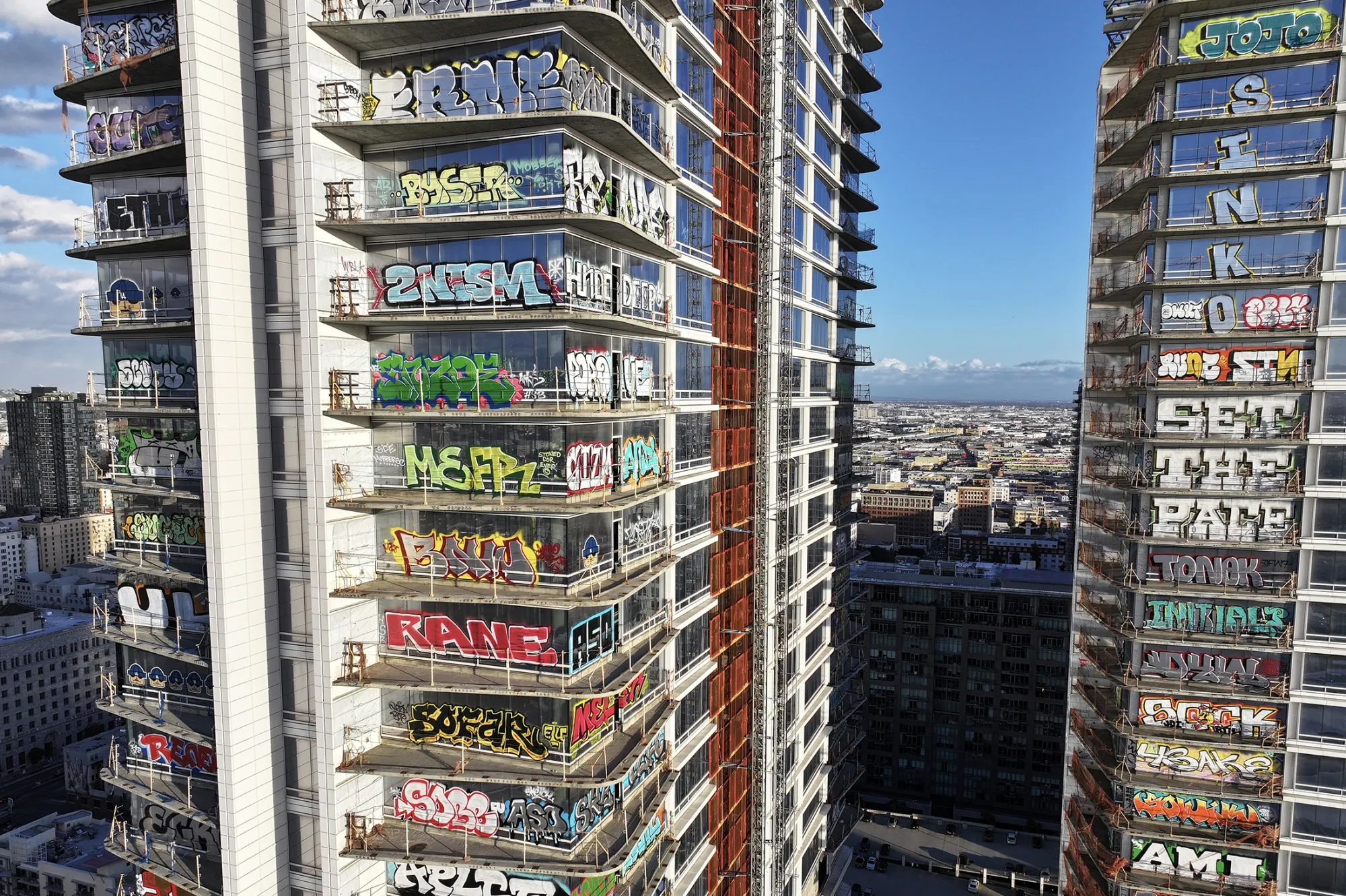 The graffiti spray-painted Oceanwide Plaza development in Los Angeles.