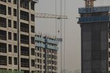 China's economy remains dragged by the property market downturn and subdued domestic demand. 
