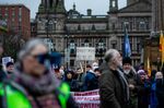 A protestor holds a sign reading "Cannot Pay Will Not Pay" during a 'current cost-of-living crisis' rally in Glasgow, U.K., on Feb. 12.