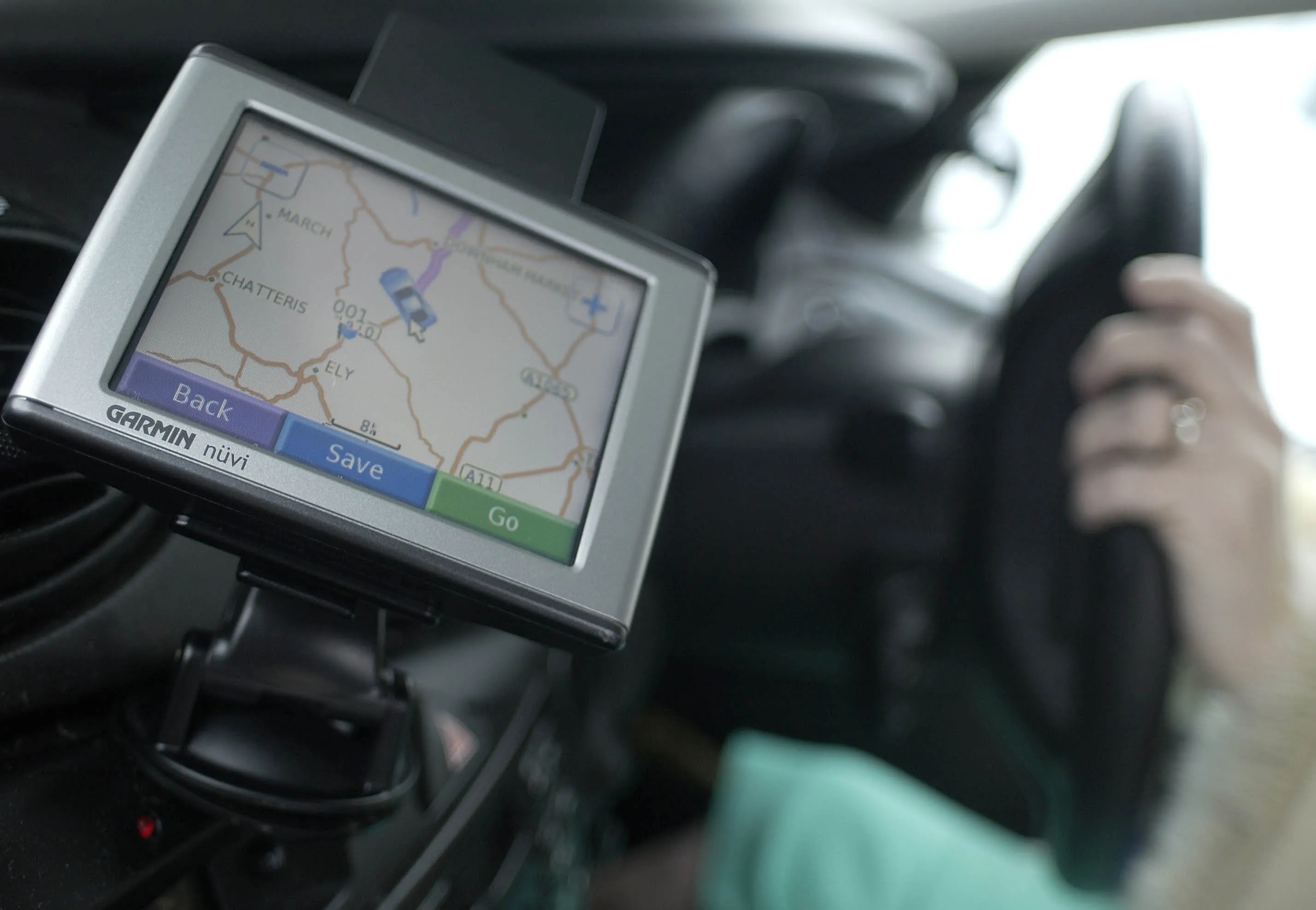 A Garmin satellite navigation system plots a course in a car in Norfolk, U.K. on Oct. 31, 2007.