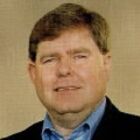 James E. Woys