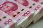 Views Of Chinese Yuan As Yuan Crunch Spurs Banks to Hoard Abroad as China Curbs Outflows