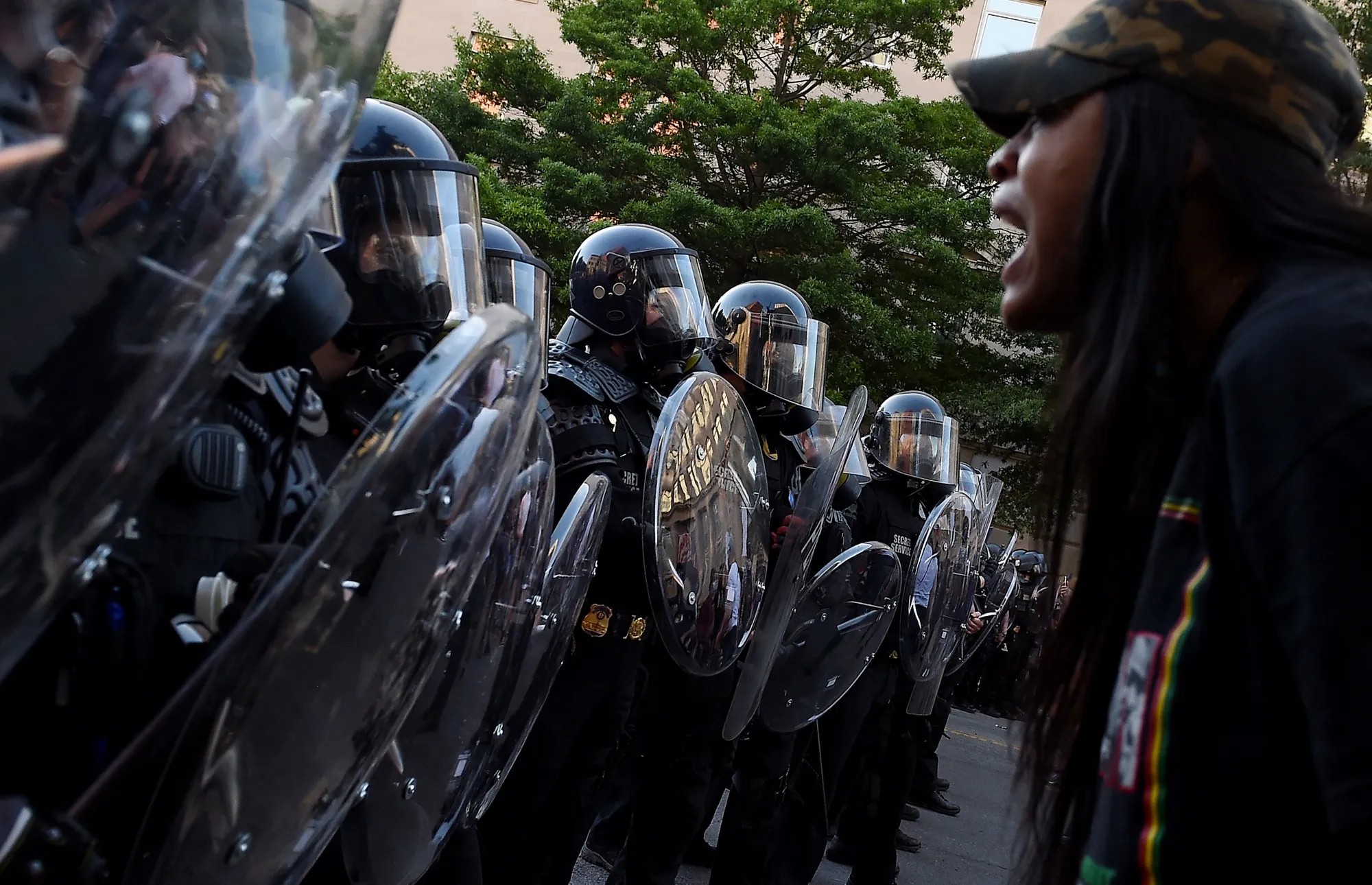 A protester screams in front of a row of police officers during a demonstration against the death of George Floyd at a park near the White House on June 1.