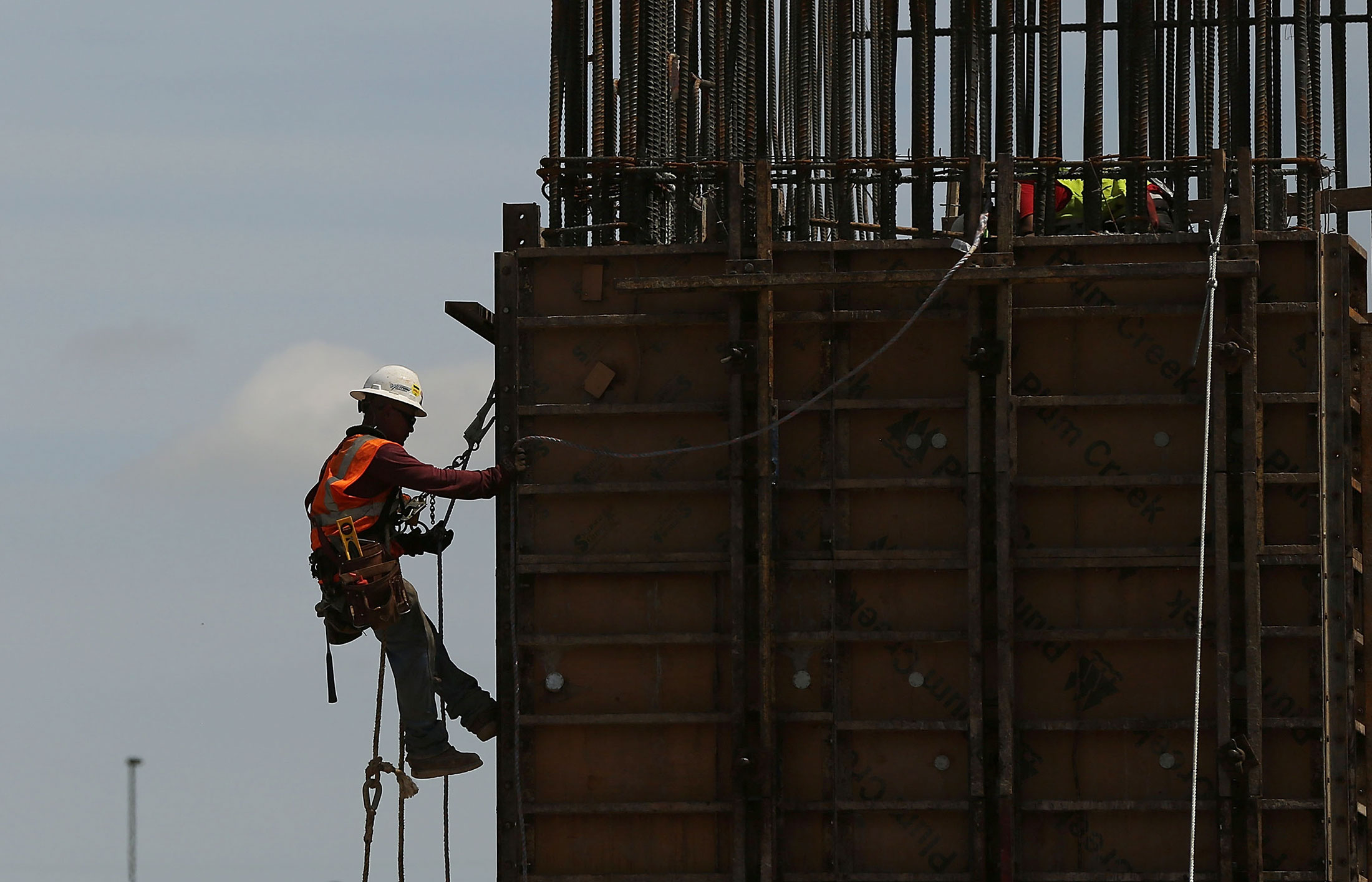 Construction workers on a job site on March 25, 2015 in Houston, Texas.
