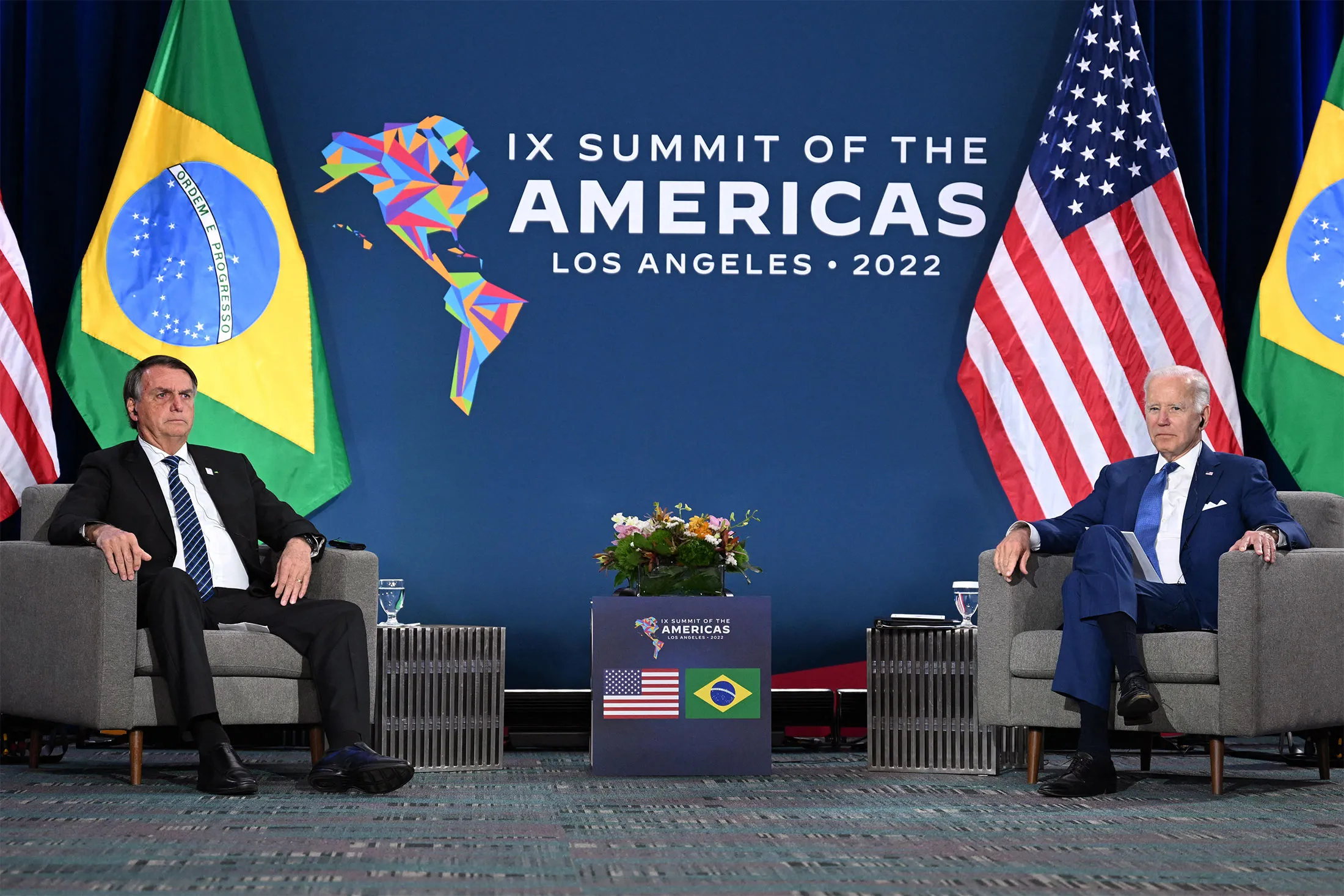US President Joe Biden, right, and Brazilian President Jair Bolsonaro in their first bilateral meeting on June 9