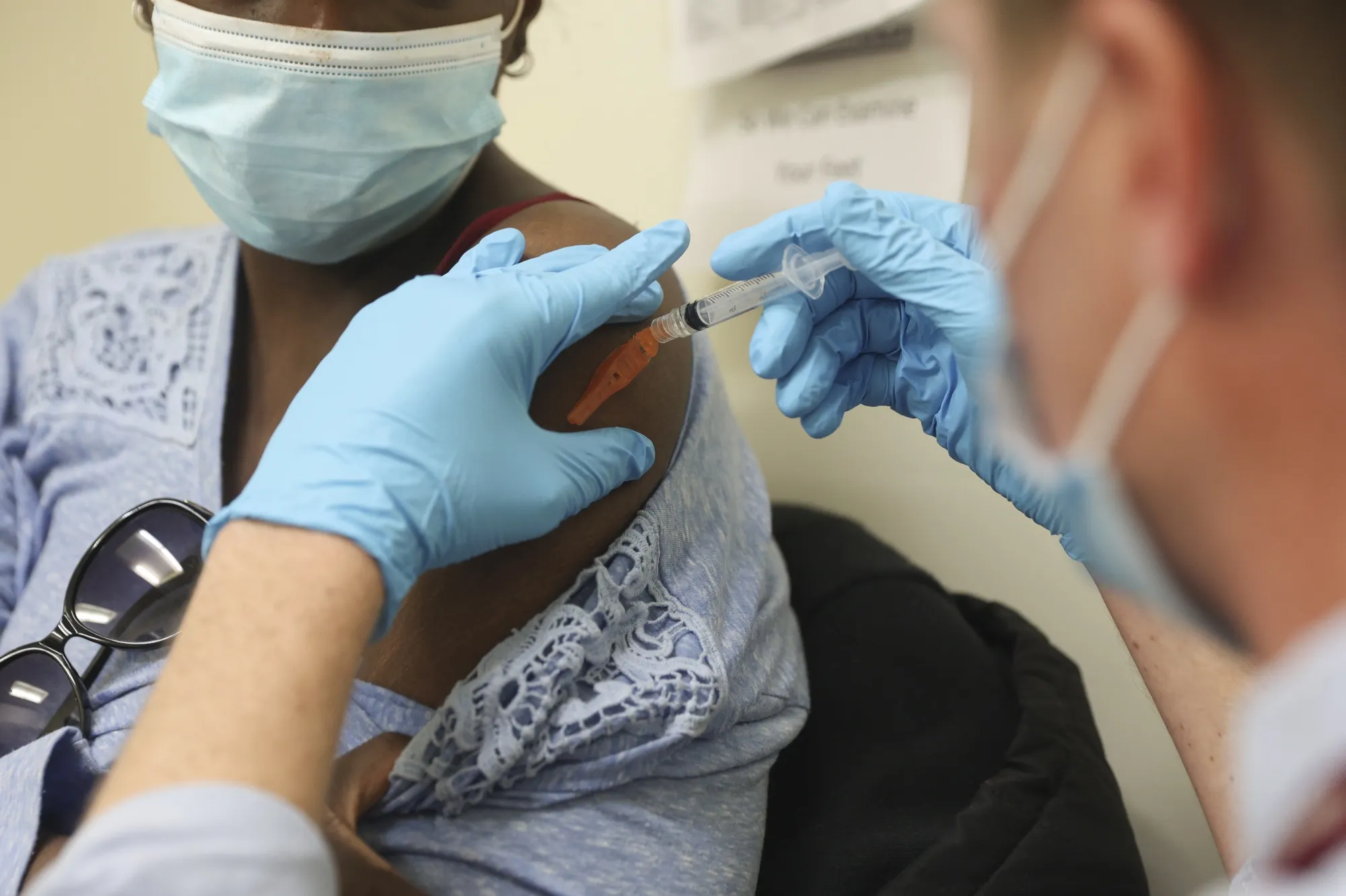 A person receives a dose of the Johnson &amp; Johnson Janssen Covid-19 vaccine in New York, U.S.