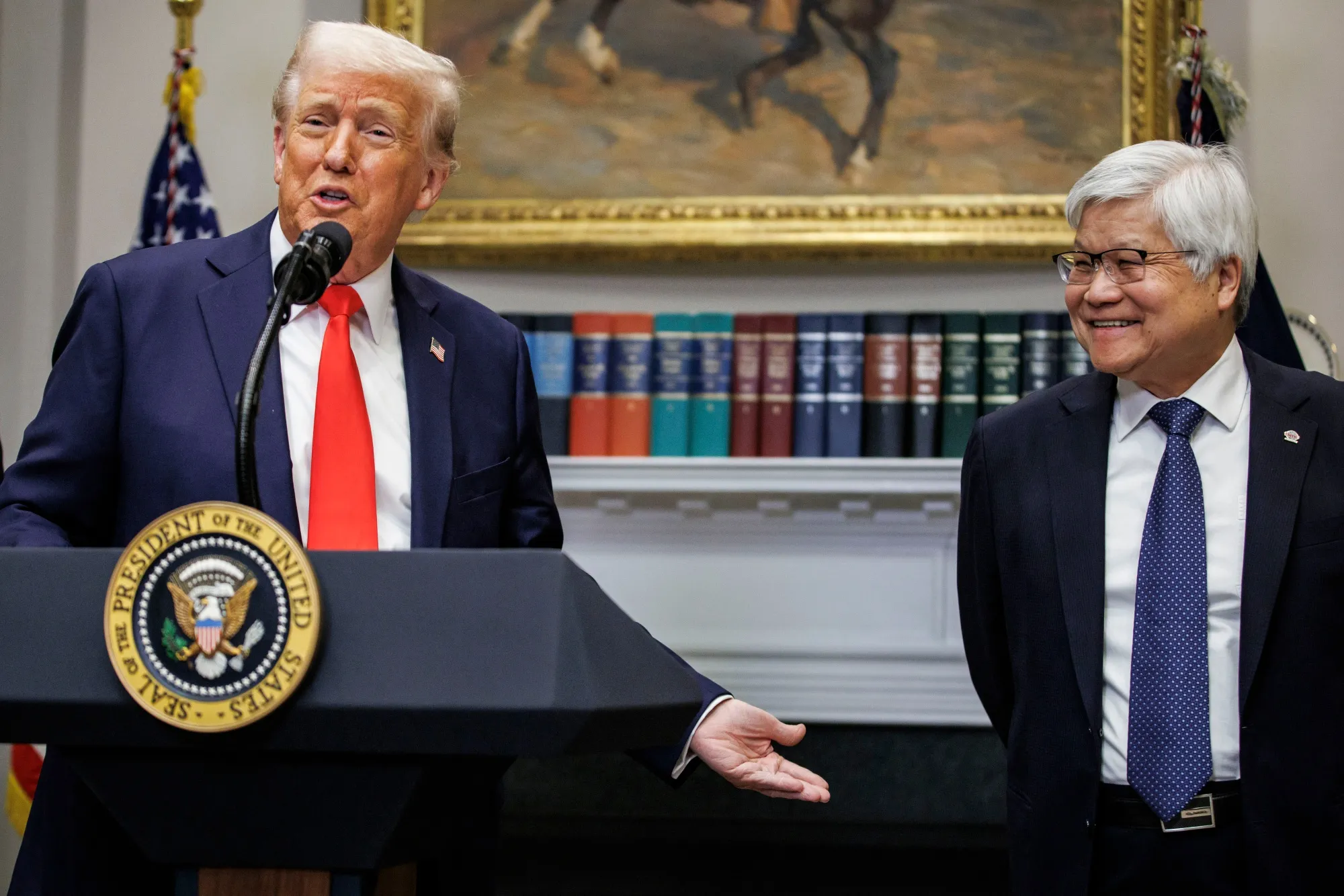 Donald Trump, left, C.C. Wei, in the Roosevelt Room of the White House on March 3.