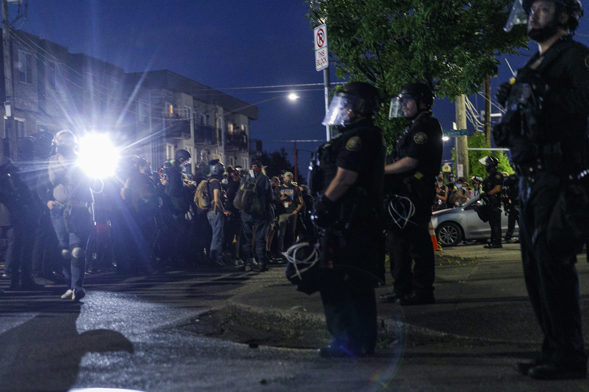 Hundreds gather at the Portland, Oregon Police Association building on July 13.