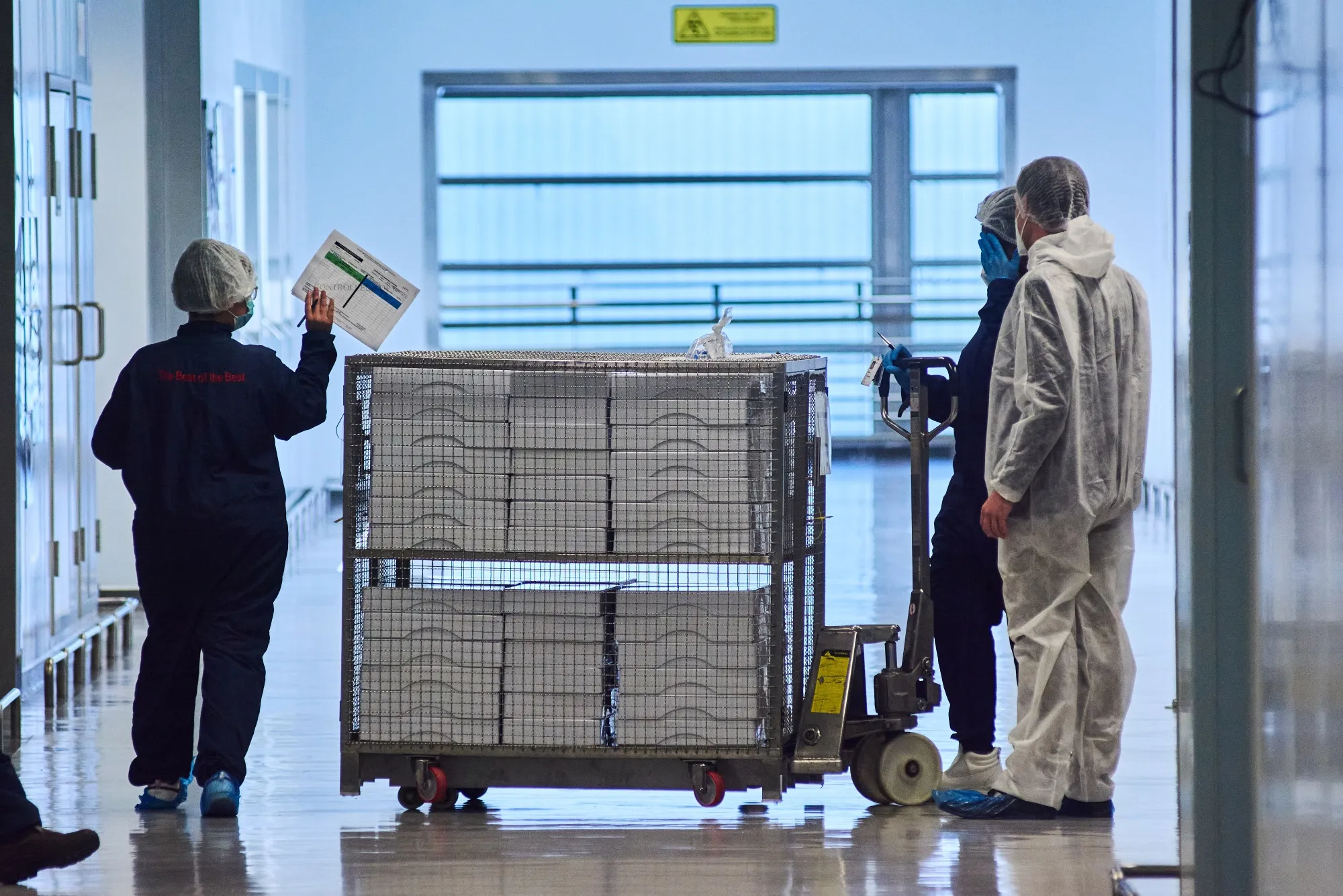 Workers transport boxes of Johnson &amp; Johnson Covid-19 vaccines from the production line&nbsp;in Gqeberha, South Africa.
