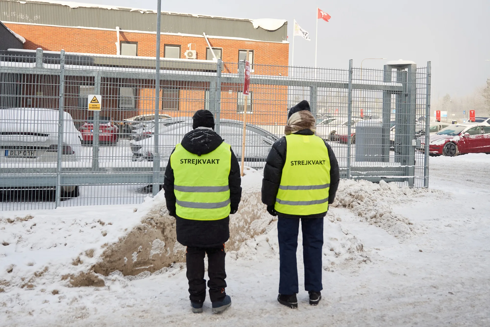 Union members during a labor protest outside the Tesla service center in Segeltorp, Sweden.