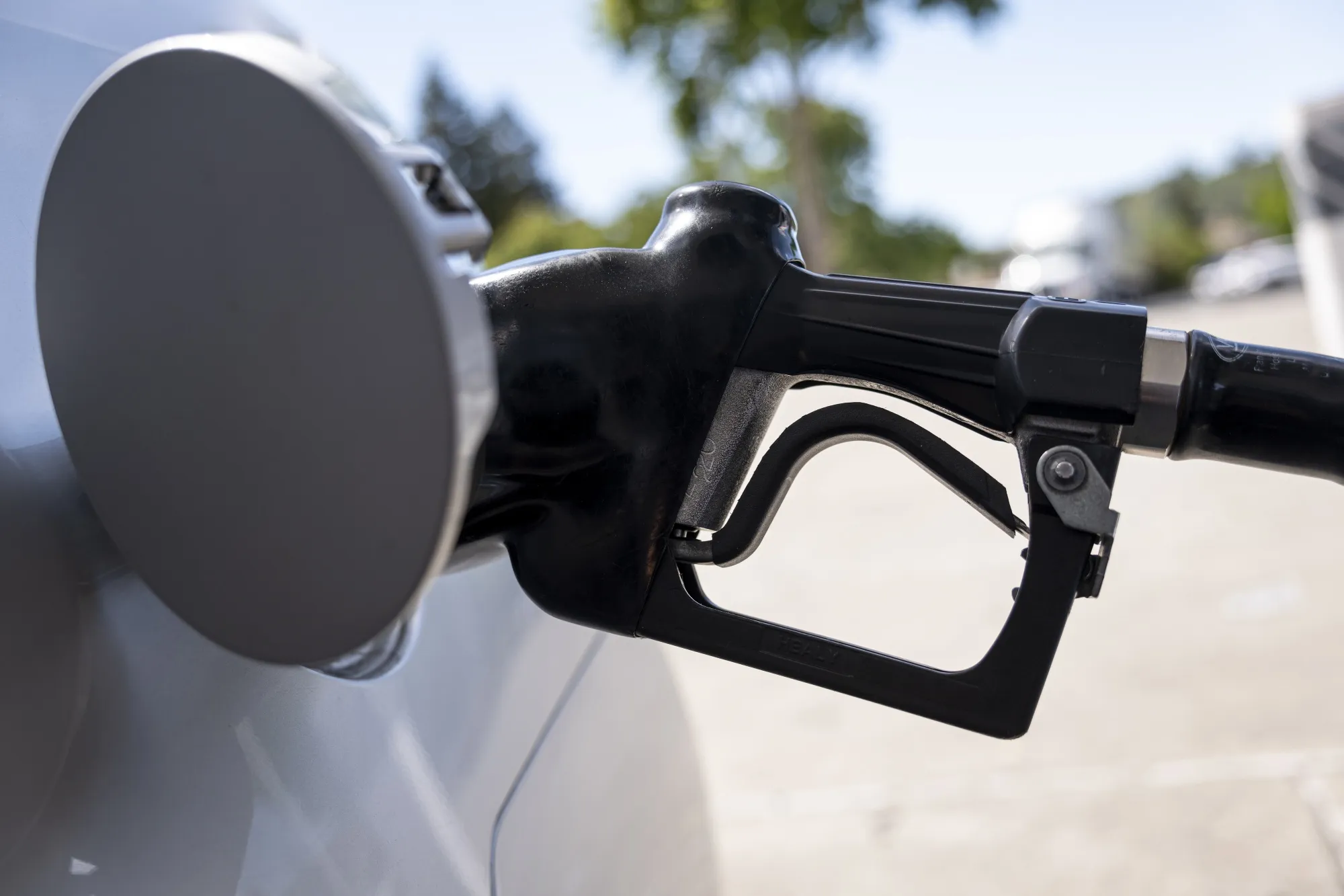 A fuel nozzle in a car at a Chevron gas station in Pinole, California.