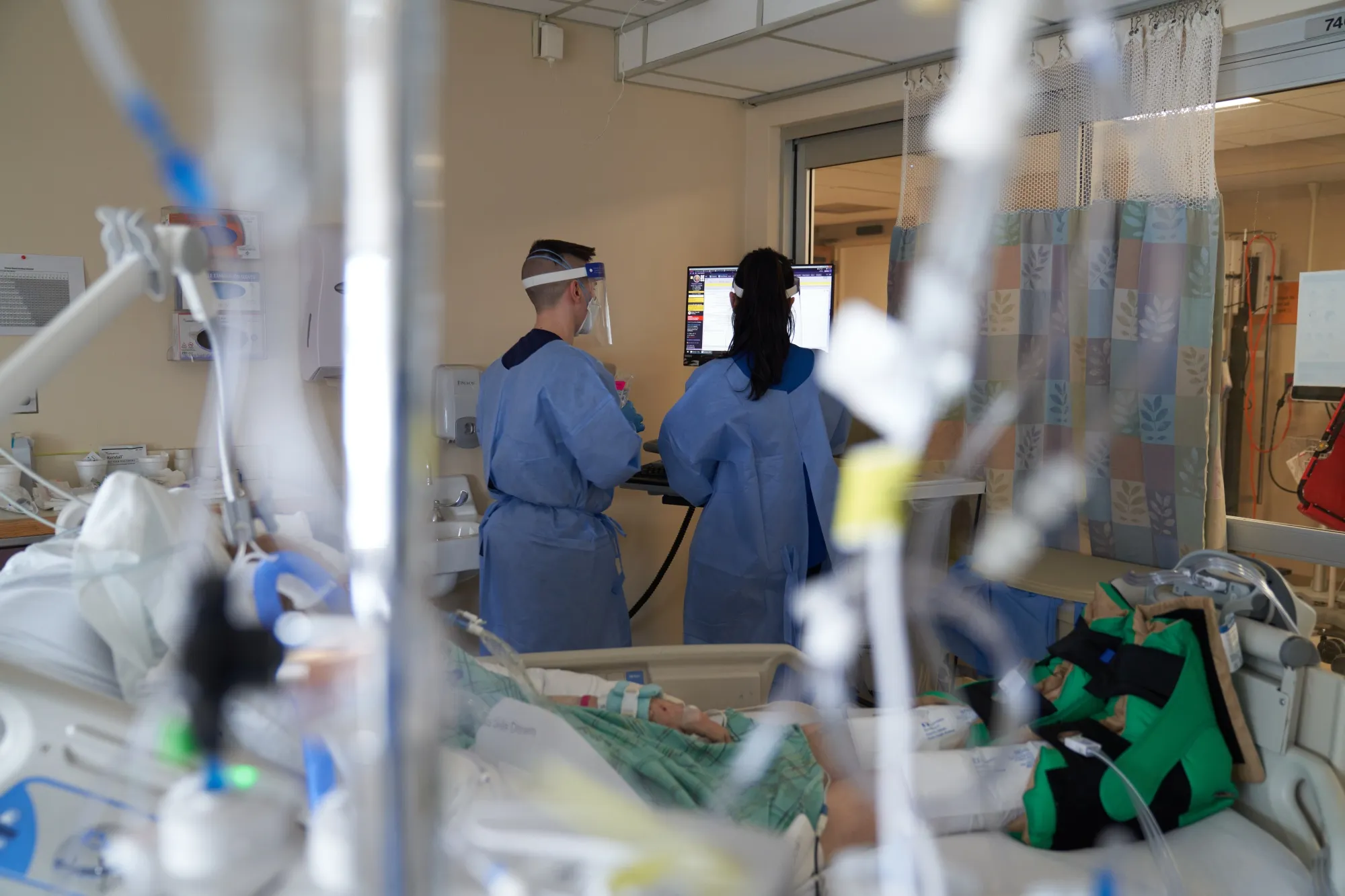 Healthcare workers treat a Covid-19 patient on the Intensive Care Unit (ICU) floor of a hospital in 2022.