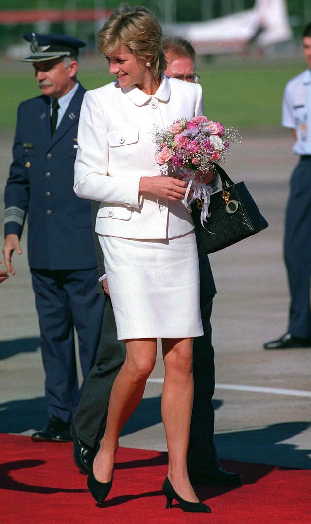 Princess Diana with a Dior purse in Argentina