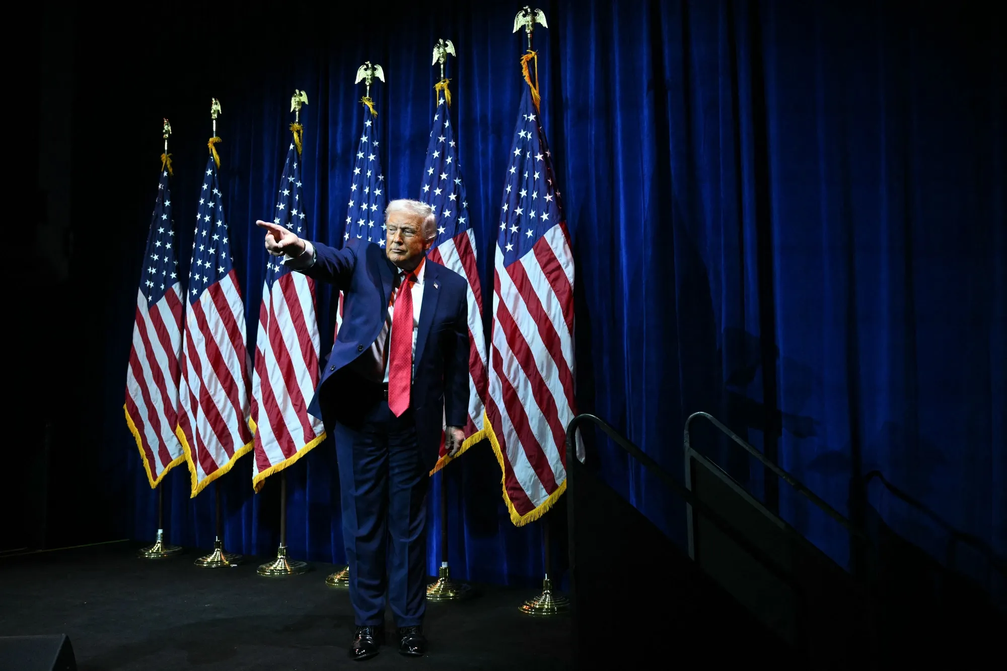 President Donald Trump addresses House Republicans at their retreat in Washington.
