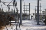 Transmission towers and power lines lead to a substation after a snow storm in Fort Worth, Texas, on Feb. 16.