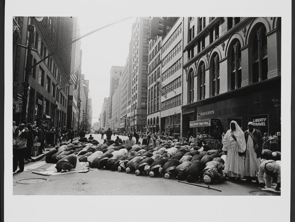 Muslims pray before Muslim Day Parade in Manhattan, 1995.