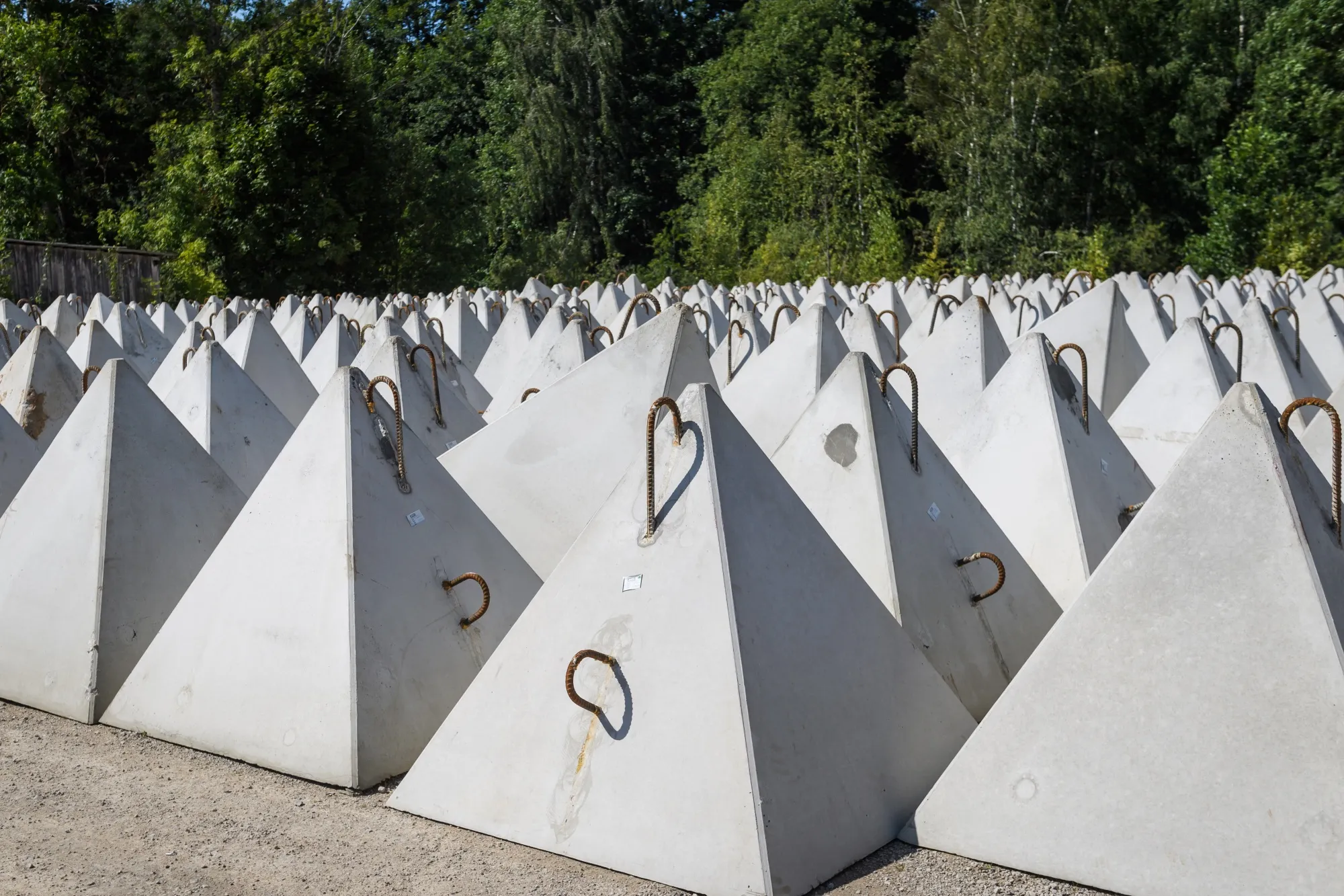 A stockpile of dragon's teeth fortifications near Latvia's border with Russia.