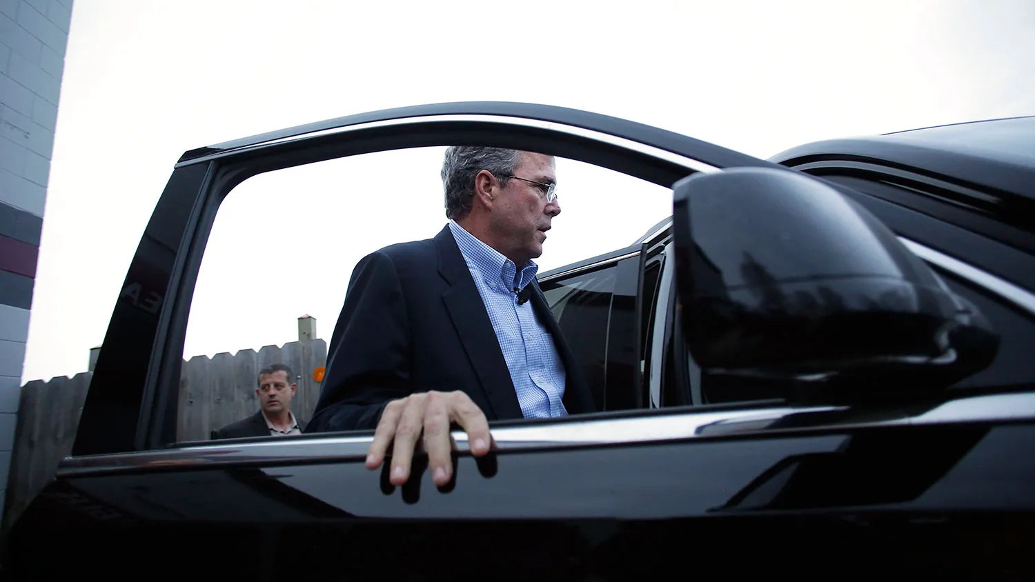 Republican presidential candidate Jeb Bush gets into his vehicle after a campaign event at the Cedar Falls Eagles Club on Jan. 30, 2016 in Cedar Falls, Iowa.
