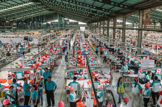 Indonesian Clothing Maker Pivots From Prada to Hazmat Suits
