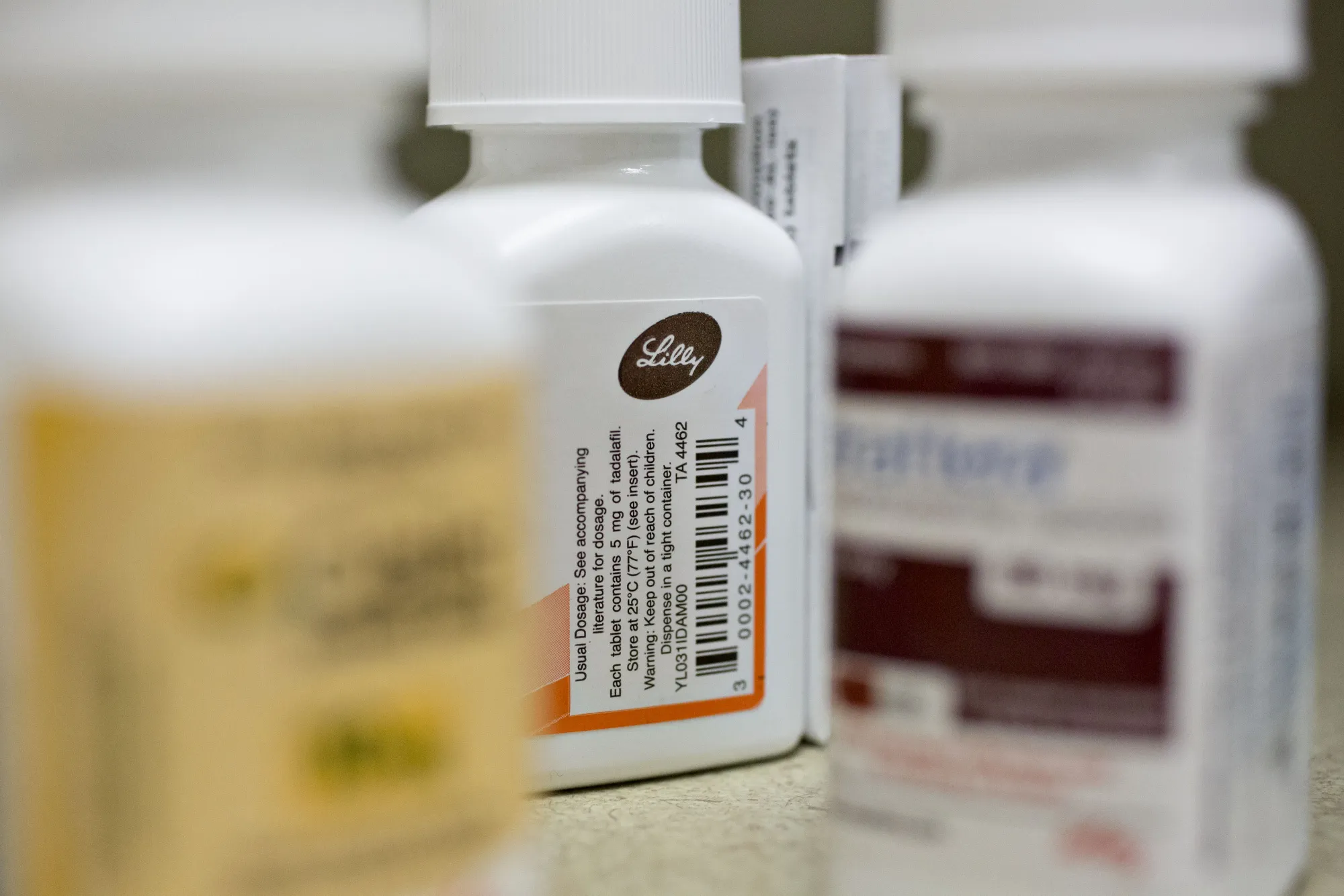An Eli Lilly &amp; Co. logo is seen on a pill bottle in this arranged photograph at a pharmacy in Princeton, Illinois, U.S., on Monday, Oct. 23, 2017.&nbsp;