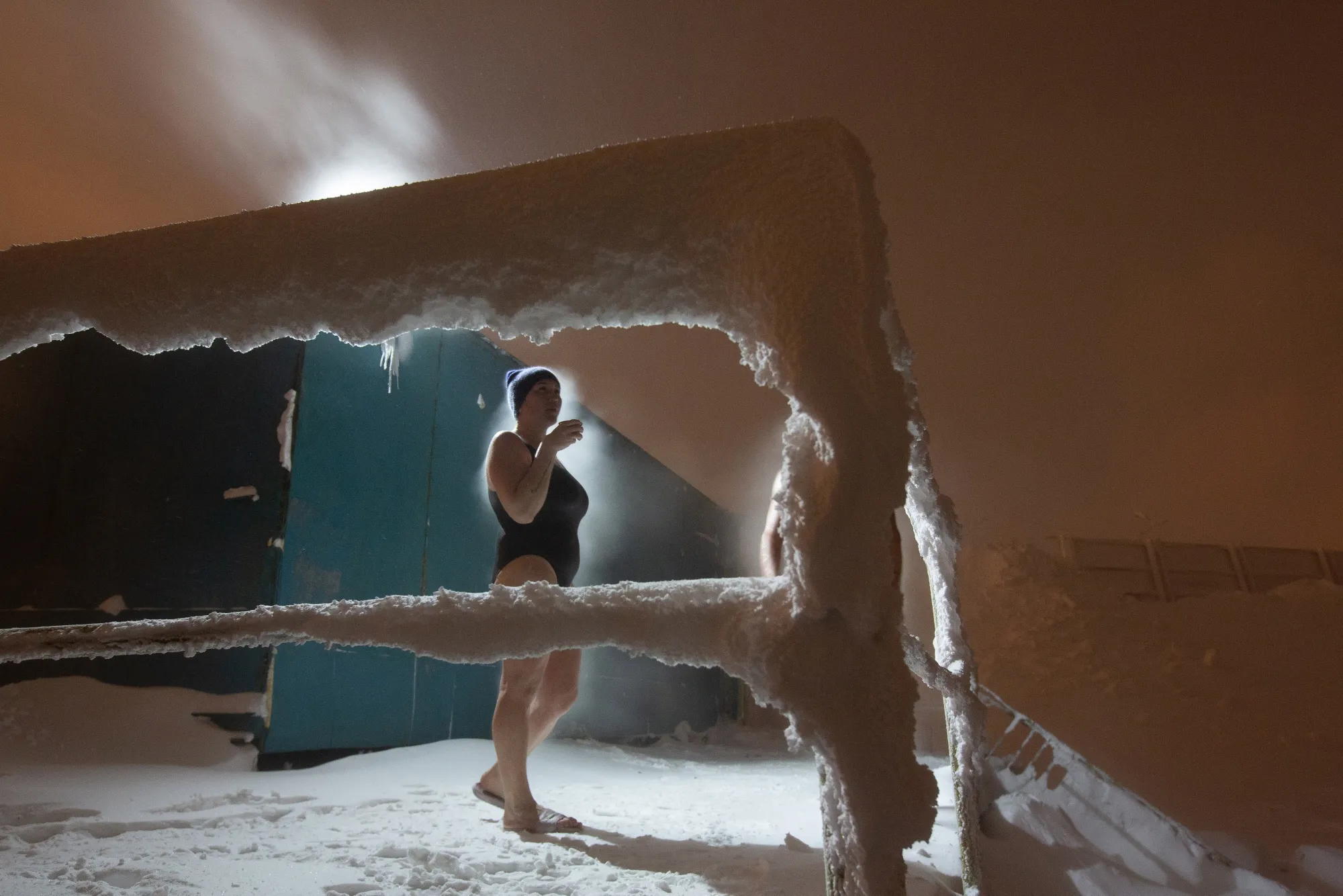 A cold-water swimmer at the Umka ice swimming club at Lake Dolgoye in Norilsk, Russia.