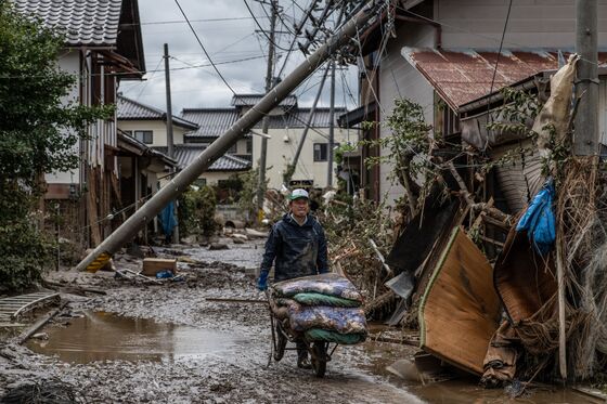 Japan Braces for Double Disaster of Covid Outbreaks at Flooding Shelters