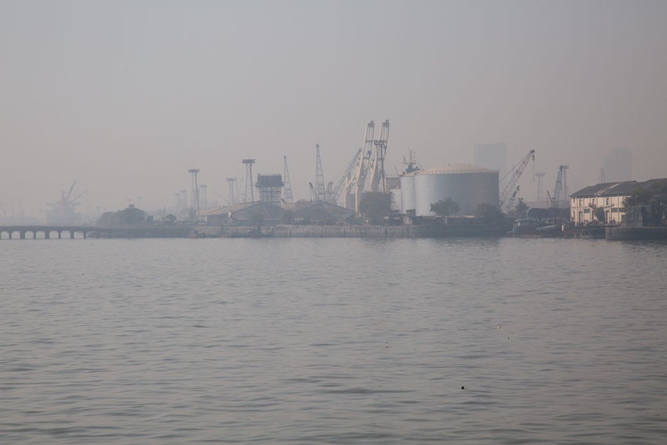 The Indira Dock, one of many along the 28-kilometers of waterfront controlled by the Mumbai Port Trust, lies less than a kilometer away from the heart of downtown Mumbai.