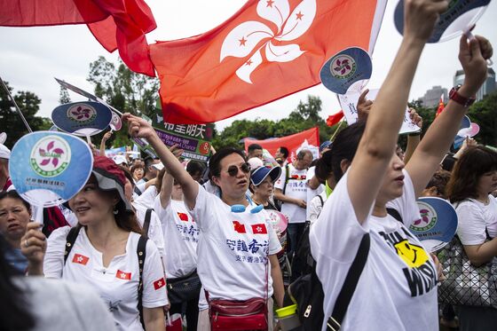 Police Fire Tear Gas to Protect China Office: Hong Kong Update