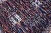 Shipping containers stand at the Qingdao Qianwan Container Terminal in this aerial photograph taken in Qingdao, China, on Monday, May 7, 2018. China's overseas shipments exceeded estimates while imports surged, as the global economy continued to support demand.