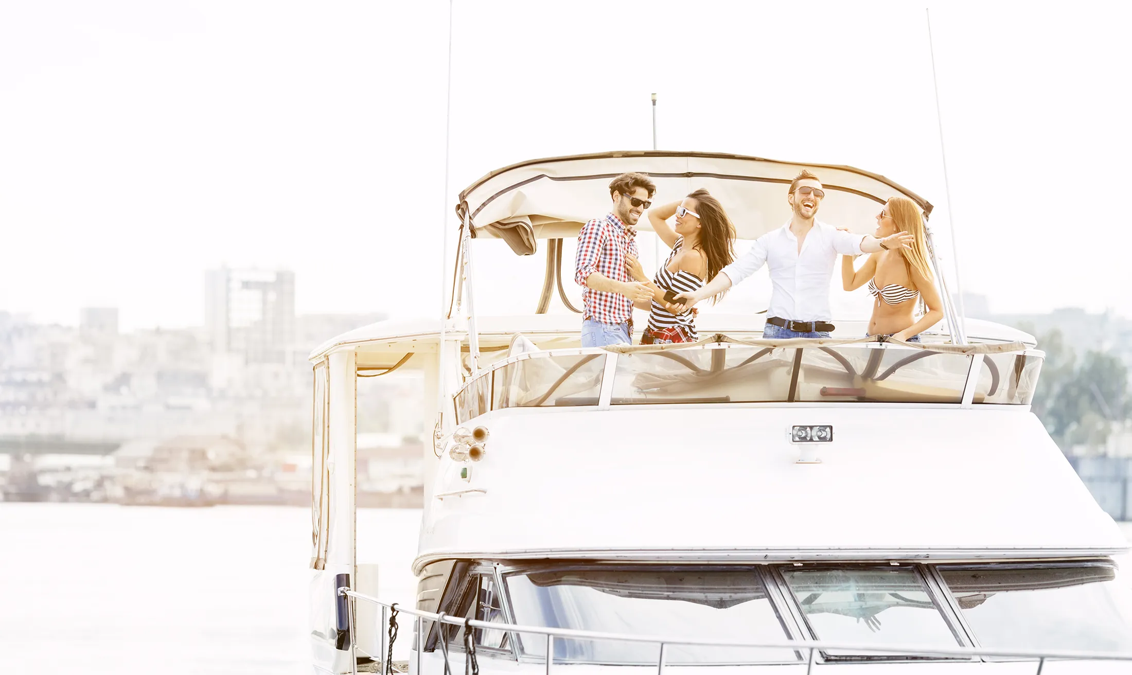 Young People Drive Yacht and having fun.