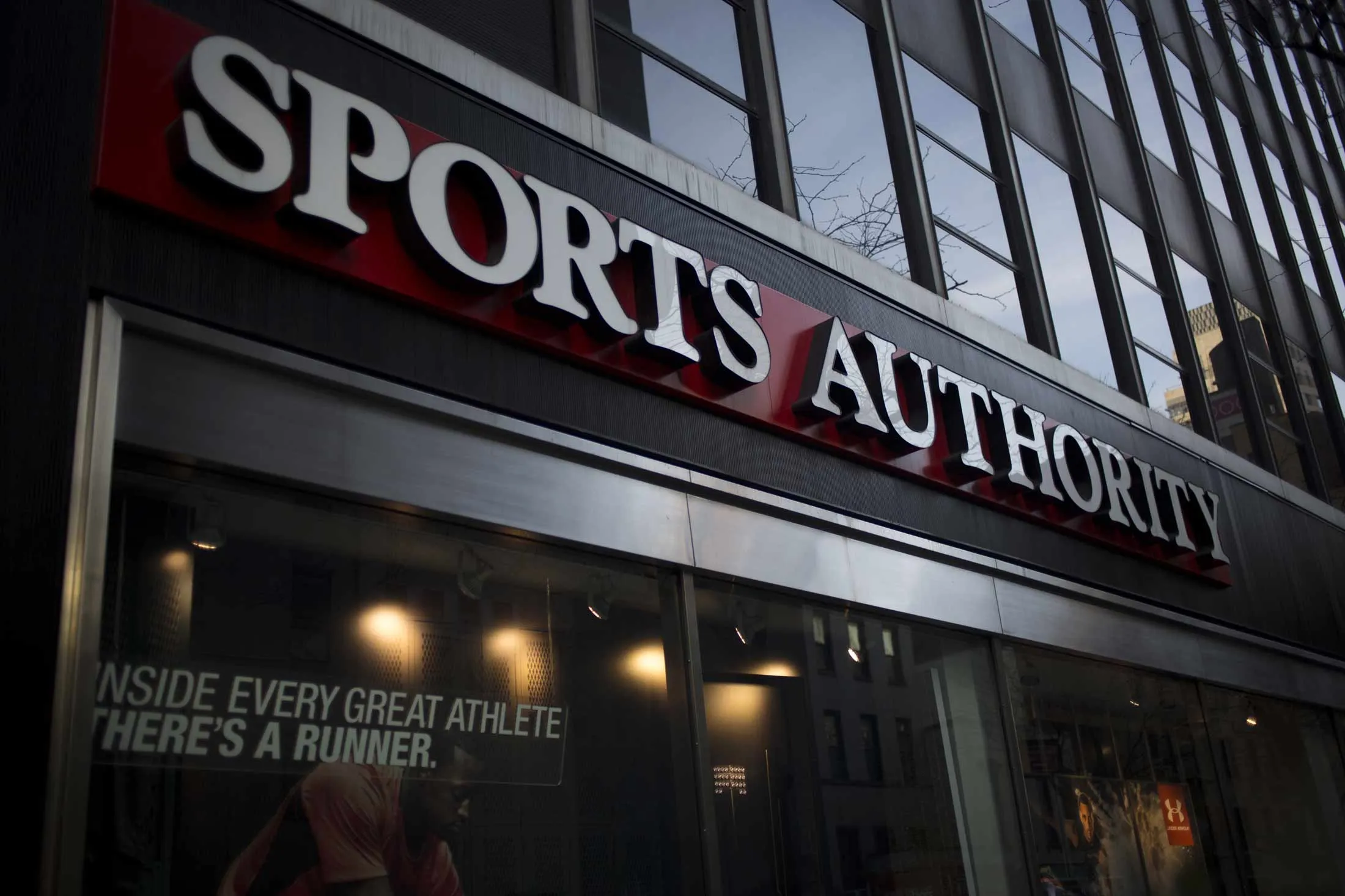 Sports Authority Inc. signage is displayed at the company's store in New York, U.S., on Saturday, Feb. 6, 2016.
