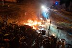 HONG KONG, CHINA - November 18: Protesters throw fire bomb as police fire water canon during a clash at The Hong Kong Poytechnic University on November 18, 2019 in Hong Kong.