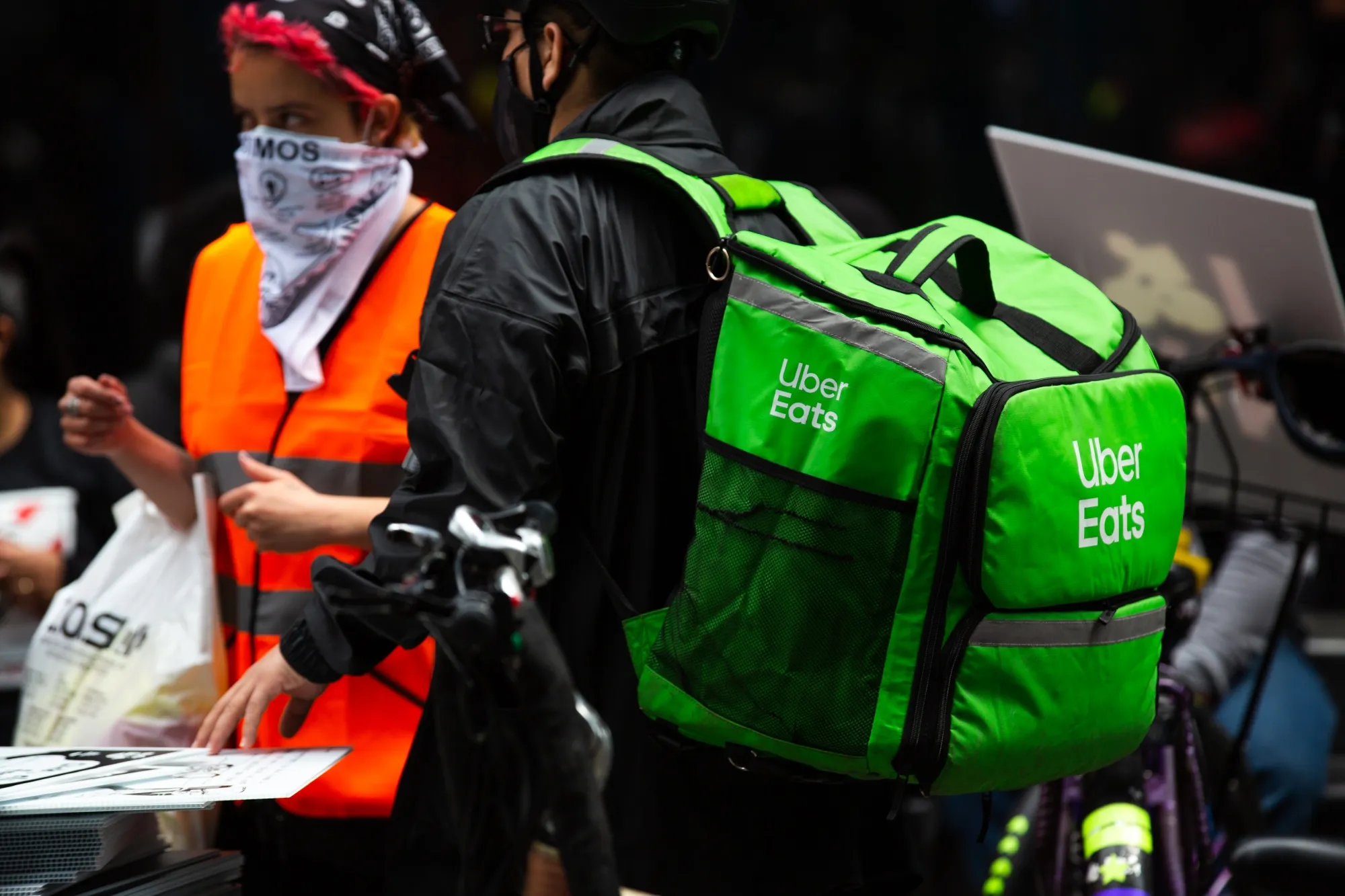 Demonstrators March For Food Delivery Workers Rights